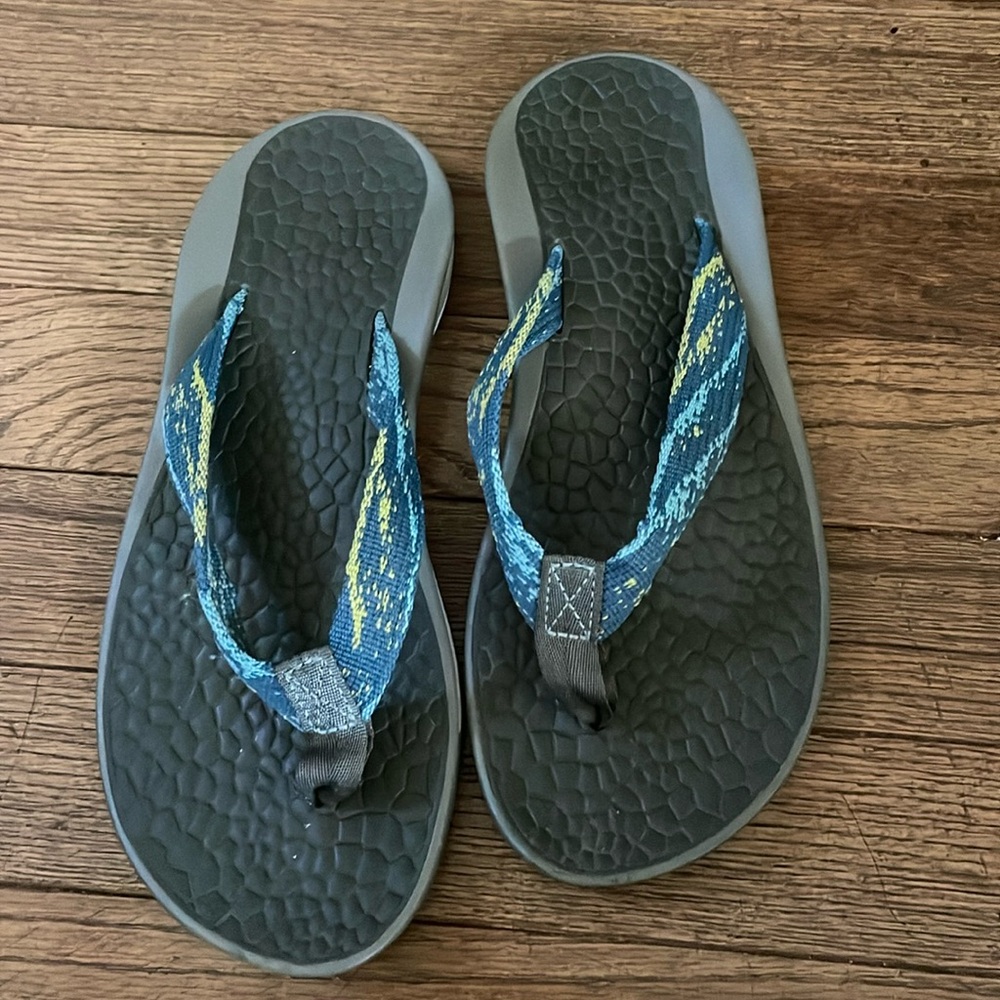 Chaco blue and green flip flops for women